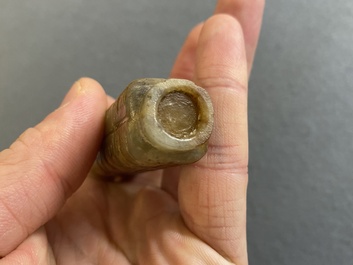 A Chinese celadon and russet jade 'cong' snuff bottle, probably Qing