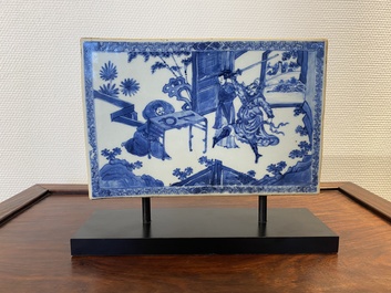 A Chinese rectangular blue and white 'beheading' tile, Kangxi
