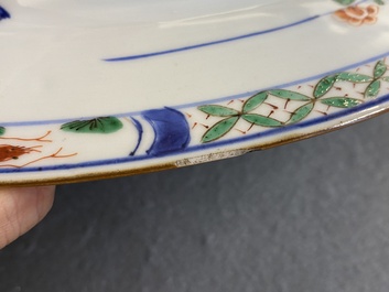 A Chinese famille verte 'mandarin ducks in a lotus pond' dish, Kangxi