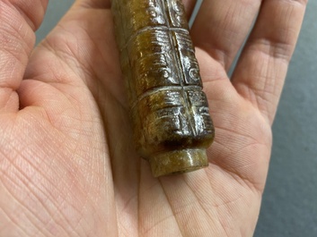 A Chinese celadon and russet jade 'cong' snuff bottle, probably Qing