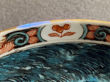 A Dutch-decorated Chinese porcelain plate with a merchant ship, Kangxi