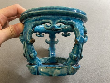 A Chinese monochrome turquoise-glazed reticulated ornament for use in a fish bowl, Kangxi