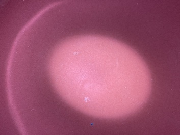 A Chinese monochrome copper-red-glazed bowl, Qianlong mark but probably later