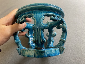 A Chinese monochrome turquoise-glazed reticulated ornament for use in a fish bowl, Kangxi