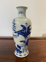 A Chinese blue and white 'two ladies and a boy' vase, Kangxi