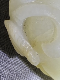 A Chinese 'twin chilong&rsquo; white jade circular pendant, Qing