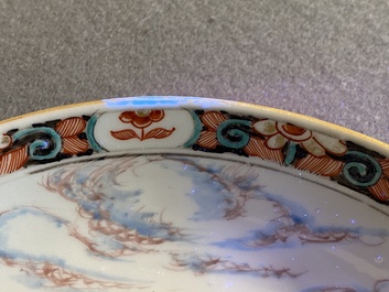 A Dutch-decorated Chinese porcelain plate with a merchant ship, Kangxi
