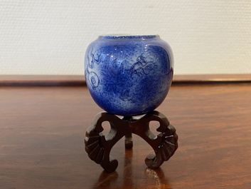 A Chinese powder-blue-glazed bird feeder with a dragon, 19th C.