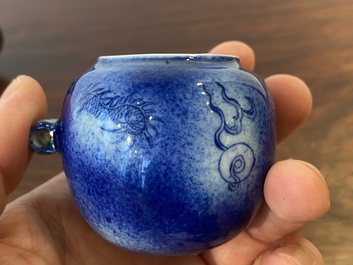 A Chinese powder-blue-glazed bird feeder with a dragon, 19th C.