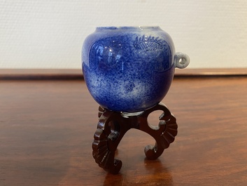 A Chinese powder-blue-glazed bird feeder with a dragon, 19th C.