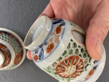 Een zeldzame Chinese famille verte opengewerkte en dubbelwandige kop en schotel, Kangxi