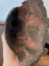 A Chinese bronze Zhen Wu with traces of red lacquer, Ming