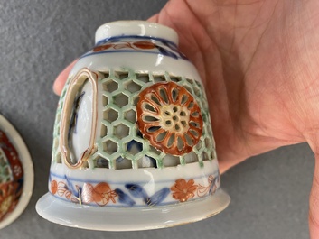 Een zeldzame Chinese famille verte opengewerkte en dubbelwandige kop en schotel, Kangxi