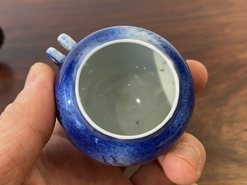 A Chinese powder-blue-glazed bird feeder with a dragon, 19th C.