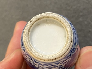 Five Chinese blue and white snuff bottles, 19th C.