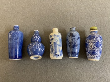 Five Chinese blue and white snuff bottles, 19th C.