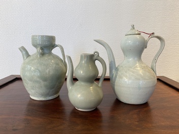 Three Chinese celadon- and qingbai-glazed jugs, Song and later