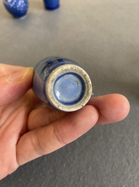 Five Chinese blue and white snuff bottles, 19th C.