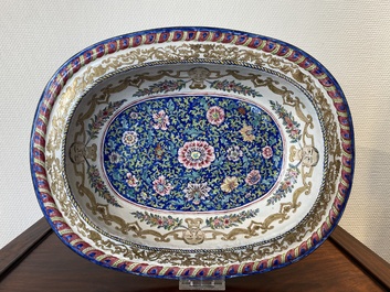 A large Chinese Canton enamel basin with garlands decorated with male heads, Qianlong