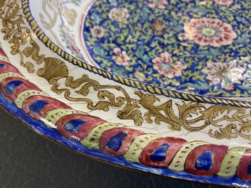 A large Chinese Canton enamel basin with garlands decorated with male heads, Qianlong