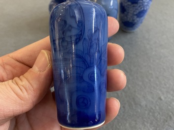 Five Chinese blue and white snuff bottles, 19th C.