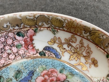 A Chinese famille rose ruby-ground cup and saucer, Yongzheng