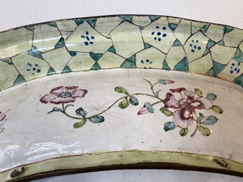 A large Chinese Canton enamel basin with garlands decorated with male heads, Qianlong