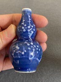 Five Chinese blue and white snuff bottles, 19th C.