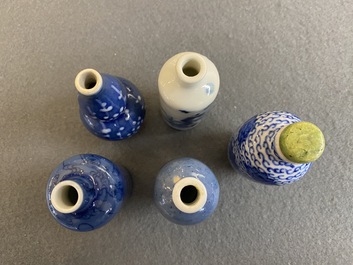 Five Chinese blue and white snuff bottles, 19th C.