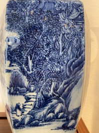A pair of Chinese blue and white hexagonal 'mountainous landscape' vases, 19th C.