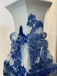 A pair of Chinese blue and white hexagonal 'mountainous landscape' vases, 19th C.