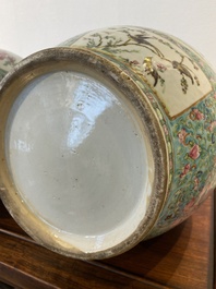 A pair of Chinese turquoise-ground famille rose vases, 19th C.