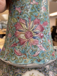 A pair of Chinese turquoise-ground famille rose vases, 19th C.