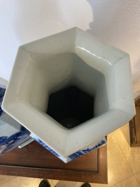 A pair of Chinese blue and white hexagonal 'mountainous landscape' vases, 19th C.