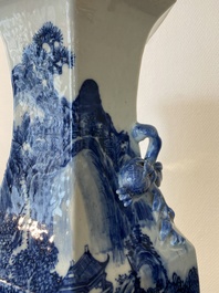 A pair of Chinese blue and white hexagonal 'mountainous landscape' vases, 19th C.