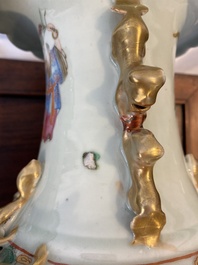 A pair of Chinese Canton famille rose 'immortals' vases, 19th C.