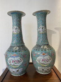 A pair of Chinese turquoise-ground famille rose vases, 19th C.