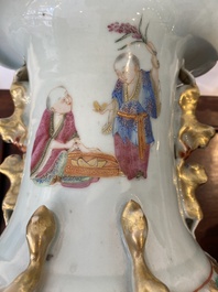 A pair of Chinese Canton famille rose 'immortals' vases, 19th C.