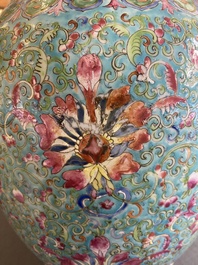 A pair of Chinese turquoise-ground famille rose vases, 19th C.