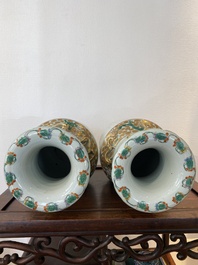 A pair of Chinese Canton famille rose 'immortals' vases, 19th C.