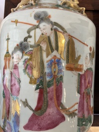 A pair of Chinese Canton famille rose 'immortals' vases, 19th C.