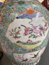 A pair of Chinese turquoise-ground famille rose vases, 19th C.