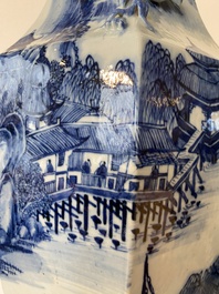 A pair of Chinese blue and white hexagonal 'mountainous landscape' vases, 19th C.