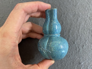 A small Chinese robin's egg-glazed three-necked double gourd vase, 19/20th C.