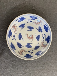 A Chinese blue, white and copper-red 'Bats and clouds' plate, Qianlong mark but probably later