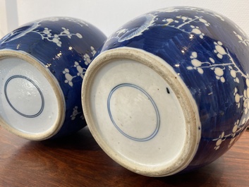 A pair of Chinese blue and white jars and covers, 19th C.