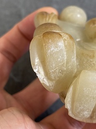 A Chinese jade sculpture of a boy, 18/19th C.