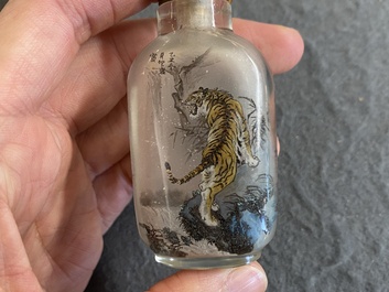 Five Chinese inside-painted glass snuff bottles and one in Canton or Beijing enamel, 19/20th C.