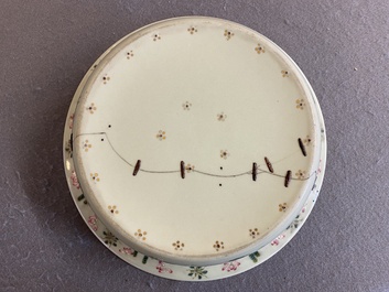 A Chinese famille rose celadon-ground 'carps' basin, 19th C.