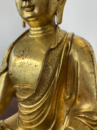 Een Chinese vergulde bronzen Boeddha Shakyamuni, wellicht Ming